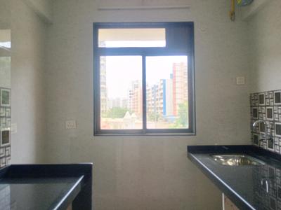 Kitchen Image of 730 Sq.ft 1 BHK Apartment / Flat for sale in Gopal Krishna Krishna Nisarga, Kalyan East Kalyan for Rs. 4250000