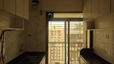 Kitchen Image of 670 Sq.ft 1 BHK Apartment / Flat for sale in Om Prabhu Manohar CHS, Seawoods Navi Mumbai for Rs. 12000000