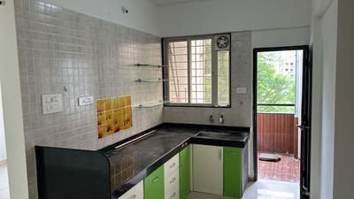 Kitchen Image of 920 Sq.ft 2 BHK Apartment / Flat for sale in Sonigara Excluzee, Hinjawadi Pune for Rs. 7400000