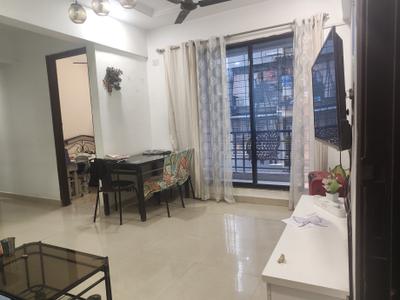 Living Room Image of 1100 Sq.ft 2 BHK Apartment / Flat for sale in Gami Radha Krishna Complex, Kamothe Navi Mumbai for Rs. 10500000