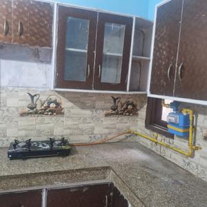 Kitchen Image of 891 Sq.ft 2 BHK Builder Floor for rent in Uttam Nagar New Delhi for Rs. 15000