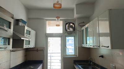 Kitchen Image of 1600 Sq.ft 3 BHK Apartment / Flat for sale in Arihant Ambience, Crossings Republik Ghaziabad for Rs. 12300000