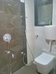 Common Bathroom Image of 850 Sq.ft 2 BHK Apartment / Flat for sale in Tharwani Millennium City Phase II, Badlapur East Badlapur for Rs. 4000000