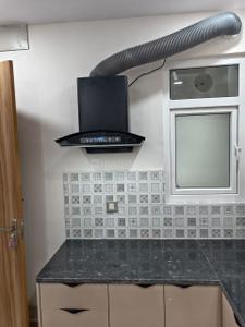 Kitchen Image of 750 Sq.ft 1 BHK Builder Floor for rent in Sector 14 Gurgaon for Rs. 33000