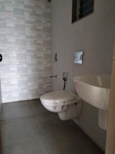 Common Bathroom Image of 700 Sq.ft 1 BHK Apartment / Flat for sale in Mahaavir Exotique Phase I, Taloja Navi Mumbai for Rs. 4500000
