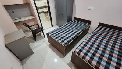 Bedroom Image of RR PG Coliving sec -12 noida in Sector 12, Noida