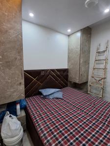 Bedroom Image of 500 Sq.ft 1 BHK Builder Floor for rent in Ramesh Nagar New Delhi for Rs. 25000