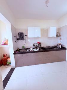 Kitchen Image of 1050 Sq.ft 2 BHK Apartment / Flat for sale in Ajmera Exotica, Wagholi Pune for Rs. 7500000