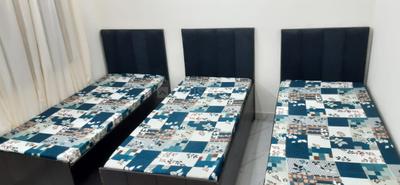 Bedroom Image of friends pg in Sector 15, Noida