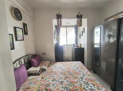 Bedroom Image of 1000 Sq.ft 2 BHK Apartment / Flat for sale in Arjun CHS, Kopar Khairane Navi Mumbai for Rs. 10000000