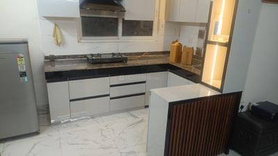 Kitchen Image of 593 Sq.ft 2 BHK Apartment / Flat for rent in Pivotal Riddhi Siddhi, Sector 99 Gurgaon for Rs. 31000