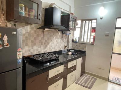 Kitchen Image of 820 Sq.ft 2 BHK Apartment / Flat for sale in Ellora Residency, Vikas Nagar Pune for Rs. 5600000