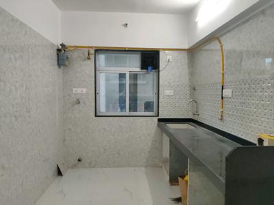 Kitchen Image of 620 Sq.ft 2 BHK Apartment / Flat for rent in Reliable Unique Shine, Vikhroli East Mumbai for Rs. 52000