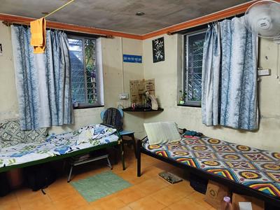 Bedroom Image of Kulkarni PG in Kothrud, Pune