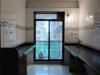 Kitchen Image of 670 Sq.ft 1 BHK Apartment / Flat for sale in Aaron Kanupriya, Kamothe Navi Mumbai for Rs. 7000000