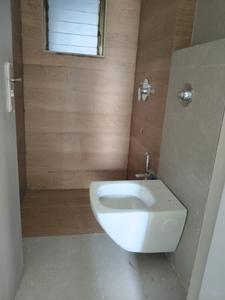 Common Bathroom Image of 690 Sq.ft 1 BHK Apartment / Flat for sale in TPV Nisarg Aura, Kharghar Navi Mumbai for Rs. 6500000