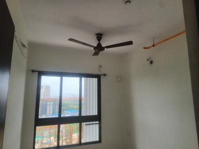Bedroom Image of 650 Sq.ft 1.5 BHK Apartment / Flat for rent in Runwal My City, Usarghar Thane for Rs. 11000