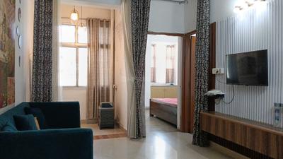 Living Room Image of 935 Sq.ft 2 BHK Apartment / Flat for rent in CGHS Rail Vihar, Sector 15 Gurgaon for Rs. 35000
