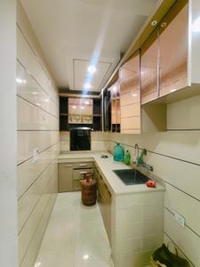 Kitchen Image of 1100 Sq.ft 3 BHK Builder Floor for rent in Dwarka Mor New Delhi for Rs. 18500