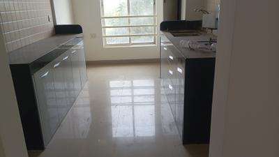 Kitchen Image of 1250 Sq.ft 2 BHK Apartment / Flat for rent in Karia Konark Orchid, Wagholi Pune for Rs. 25000