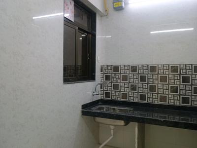 Kitchen Image of 925 Sq.ft 1.5 BHK Apartment / Flat for sale in Nisarg Greens, Ambernath East Ambernath for Rs. 4198000