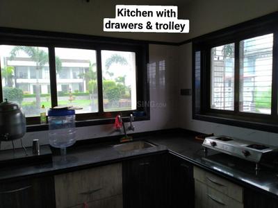 Kitchen Image of 1000 Sq.ft 3 BHK Duplex for rent in Barbodhan Surat for Rs. 14000