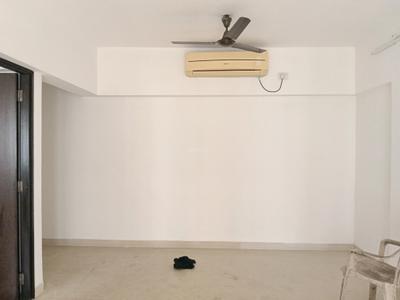 Living Room Image of 950 Sq.ft 2 BHK Apartment / Flat for sale in Raunak Unnathi Woods Phase VI F1, Kasarvadavali Thane for Rs. 9000000