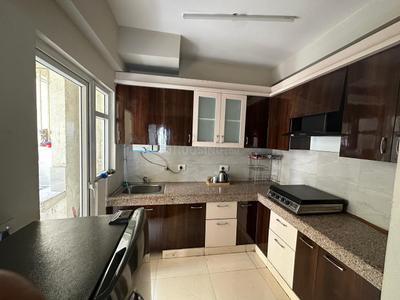 Kitchen Image of 1045 Sq.ft 2 BHK Apartment / Flat for sale in Paramount Floraville, Sector 137 Noida for Rs. 11500000