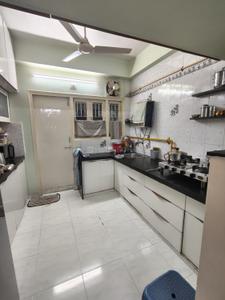 Kitchen Image of 1053 Sq.ft 2 BHK Apartment / Flat for rent in Satellite Ahmedabad for Rs. 35000