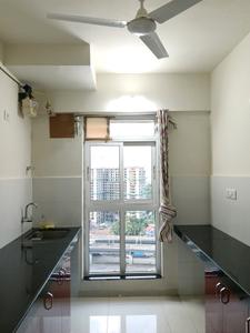 Kitchen Image of 650 Sq.ft 2 BHK Apartment / Flat for rent in Godrej Emerald, Kasarvadavali Thane for Rs. 26643