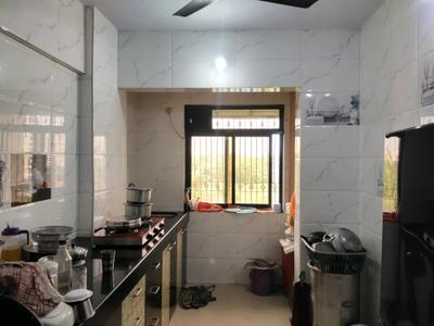 Kitchen Image of 885 Sq.ft 2 BHK Apartment / Flat for sale in Thakurli Thane for Rs. 6800000
