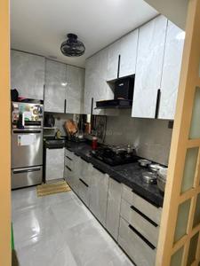 Kitchen Image of 720 Sq.ft 1.5 BHK Apartment / Flat for sale in Paras EL Signora, Andheri West Mumbai for Rs. 16000000