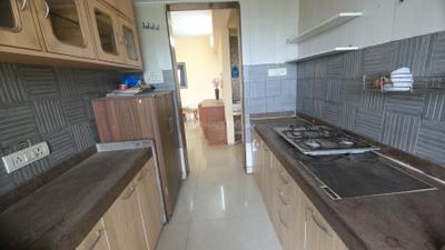 Kitchen Image of 1195 Sq.ft 2 BHK Apartment / Flat for sale in Tharwani Riviera, Kharghar Navi Mumbai for Rs. 12000000