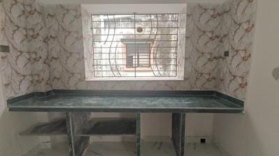 Kitchen Image of 680 Sq.ft 2 BHK Apartment / Flat for sale in Purba Barisha Kolkata for Rs. 2400000