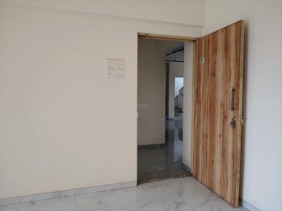 Living Room Image of 630 Sq.ft 1 BHK Apartment / Flat for sale in Uptown Ravechi Height, Kamothe Navi Mumbai for Rs. 6900000