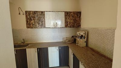 Kitchen Image of 1000 Sq.ft 2 BHK Apartment / Flat for rent in Pigeon Spring Meadows, Noida Extension Greater Noida for Rs. 18500