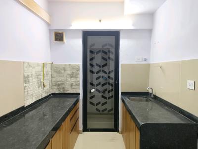 Kitchen Image of 950 Sq.ft 2 BHK Apartment / Flat for sale in Lodha Palava Downtown, Palava Phase 2 Thane for Rs. 5800000