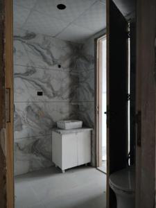 Common Bathroom Image of 1095 Sq.ft 2 BHK Apartment / Flat for sale in Devla Greater Noida for Rs. 3746524