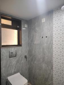 Common Bathroom Image of 710 Sq.ft 1 BHK Apartment / Flat for rent in Raunak Bliss Phase A A3, Kasarvadavali Thane for Rs. 18500