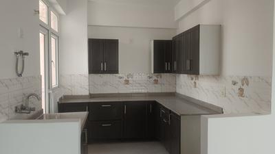 Kitchen Image of 1230 Sq.ft 3 BHK Apartment / Flat for sale in Amrapali Empire, Crossings Republik Ghaziabad for Rs. 8700000