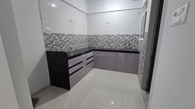 Kitchen Image of 950 Sq.ft 2 BHK Apartment / Flat for rent in Infinity Planet C and D Wing, Moshi Pune for Rs. 18000