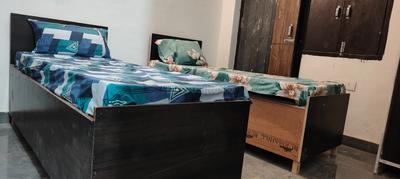 Bedroom Image of Aastha pg in Sector 67, Gurgaon