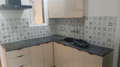 Kitchen Image of 750 Sq.ft 1 BHK Builder Floor for rent in Sector 14 Gurgaon for Rs. 33000