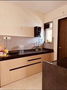 Kitchen Image of 1049 Sq.ft 2 BHK Apartment / Flat for sale in Metropark County, Balewadi Pune for Rs. 12500000