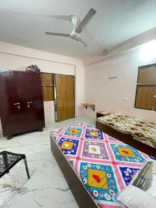 Bedroom Image of J.S LUXURY PG in Bajidpur, Noida