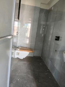 Common Bathroom Image of 688 Sq.ft 1 BHK Apartment / Flat for sale in Pushpak Nagar Navi Mumbai for Rs. 5025000