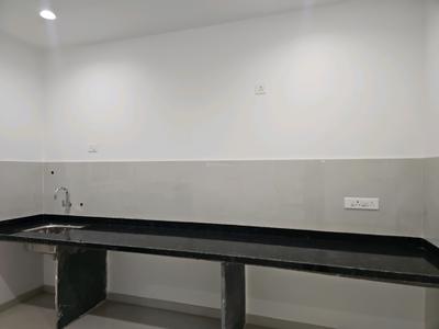 Kitchen Image of 1450 Sq.ft 3 BHK Apartment / Flat for sale in Kosmic Kourtyard Phase 1, Wagholi Pune for Rs. 8500000