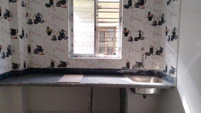 Kitchen Image of 950 Sq.ft 3 BHK Apartment / Flat for sale in Behala Kolkata for Rs. 2700000