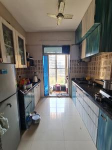 Kitchen Image of 900 Sq.ft 2 BHK Apartment / Flat for sale in Sai Trilok Heights, Thakurli Thane for Rs. 6800000
