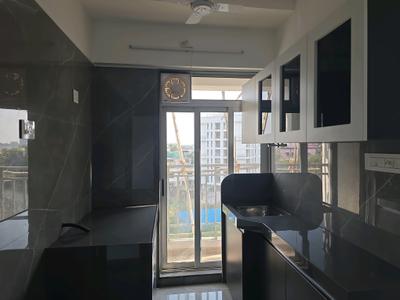Kitchen Image of 730 Sq.ft 1 BHK Apartment / Flat for sale in Mansarovar Pearl Gardens, Vasai West Vasai for Rs. 4950100